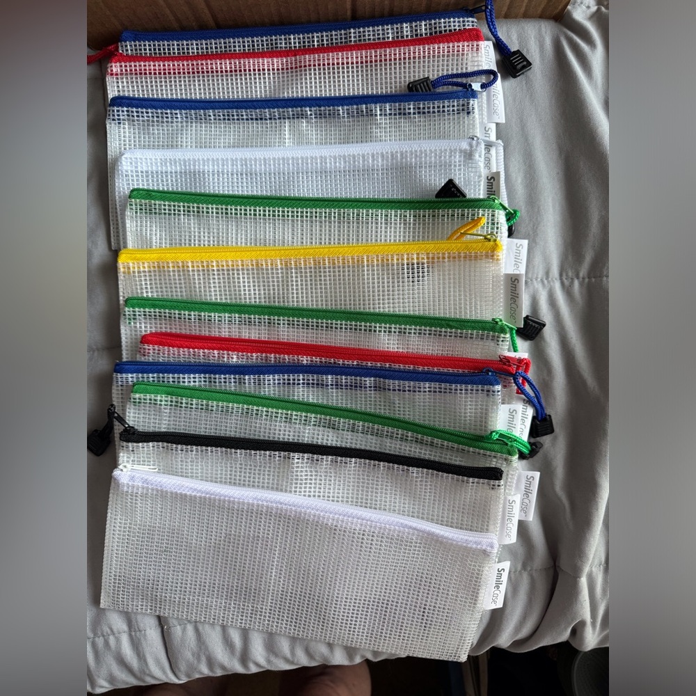 12 zipper pouches w/ slot for business card